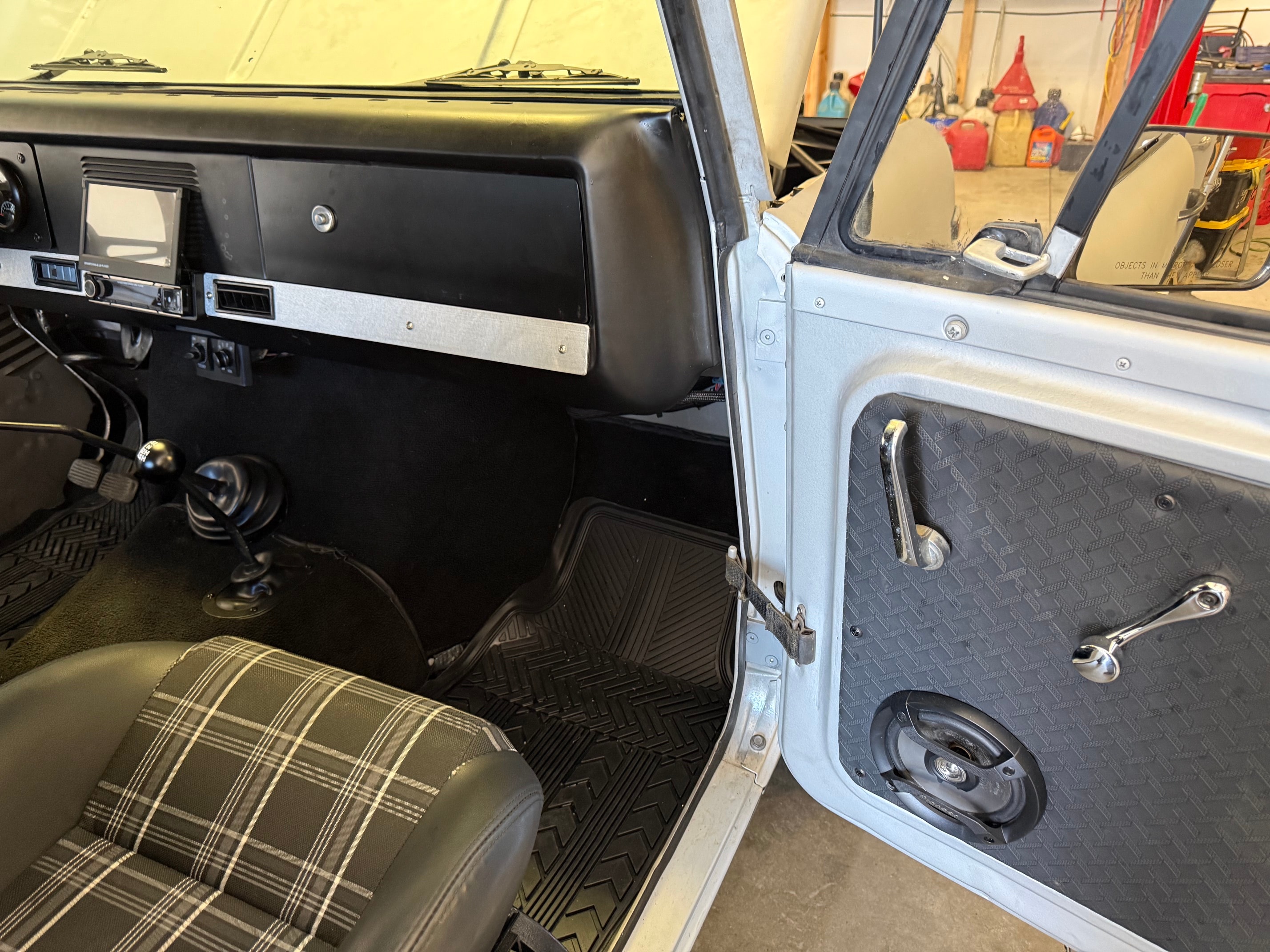 Interior dash plaid seats door panel detail